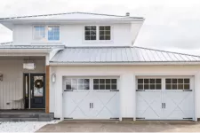 Modern Farmhouse 2-storey house with 2 Carriage House garage doors with real overlays - Design Credit: Shoana Jensen | Photo Credit: Arthur Mola