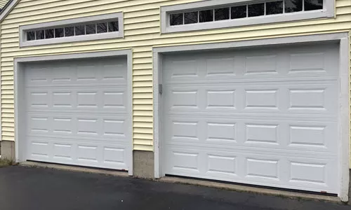 Yellow vinyl house with Classic CC garage doors, 9' x 7', Ice White