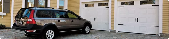 a car in front of garage door 