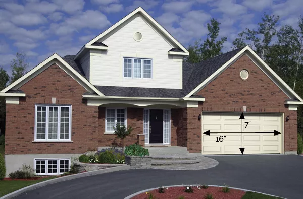 House with a garage door over 150 sq. ft. (14 square meters)