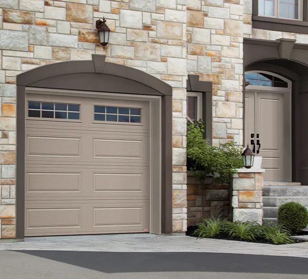 Single Traditional Style garage door with the Classic XL design in the Claystone color
