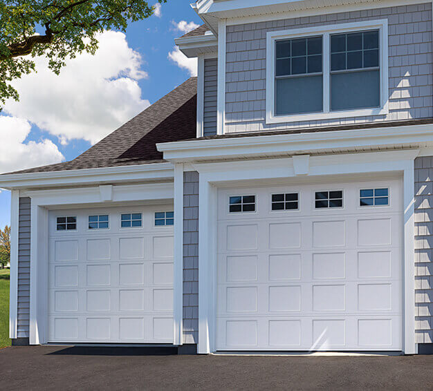 Double Traditional Style garage doors with the Shaker-Flat Short design in the White colour